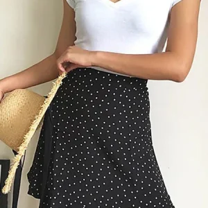 Jupe courte pois blanc